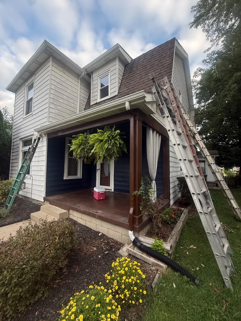 Splash It Painting crew prepping a house exterior in Indianapolis IN